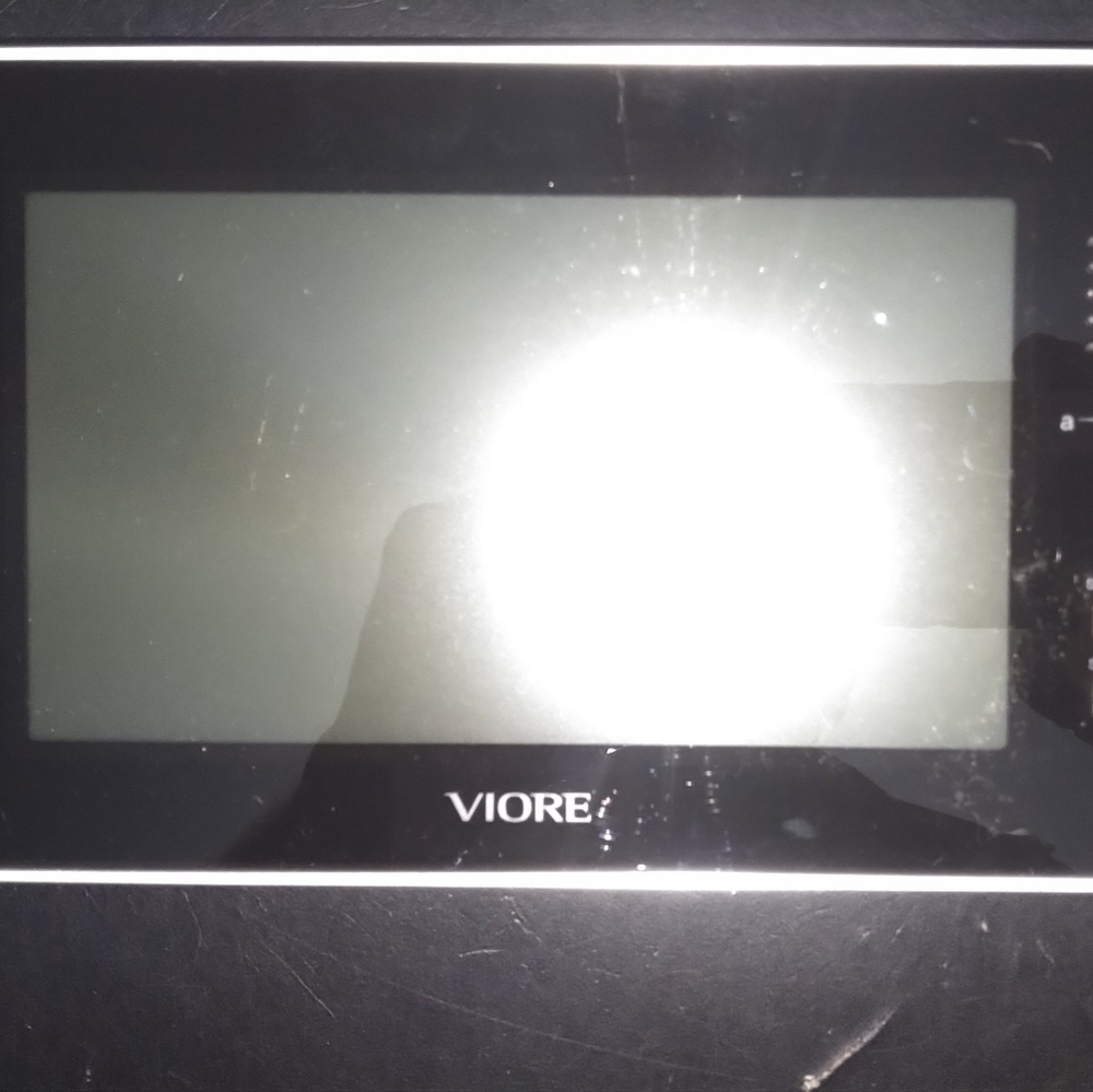 Viore PLC7V96 7" Portable LCD Television with attachments and carying case. Used